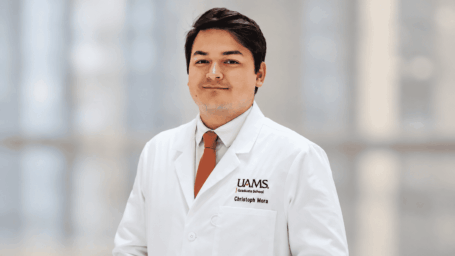 male scientist in a white lab coat
