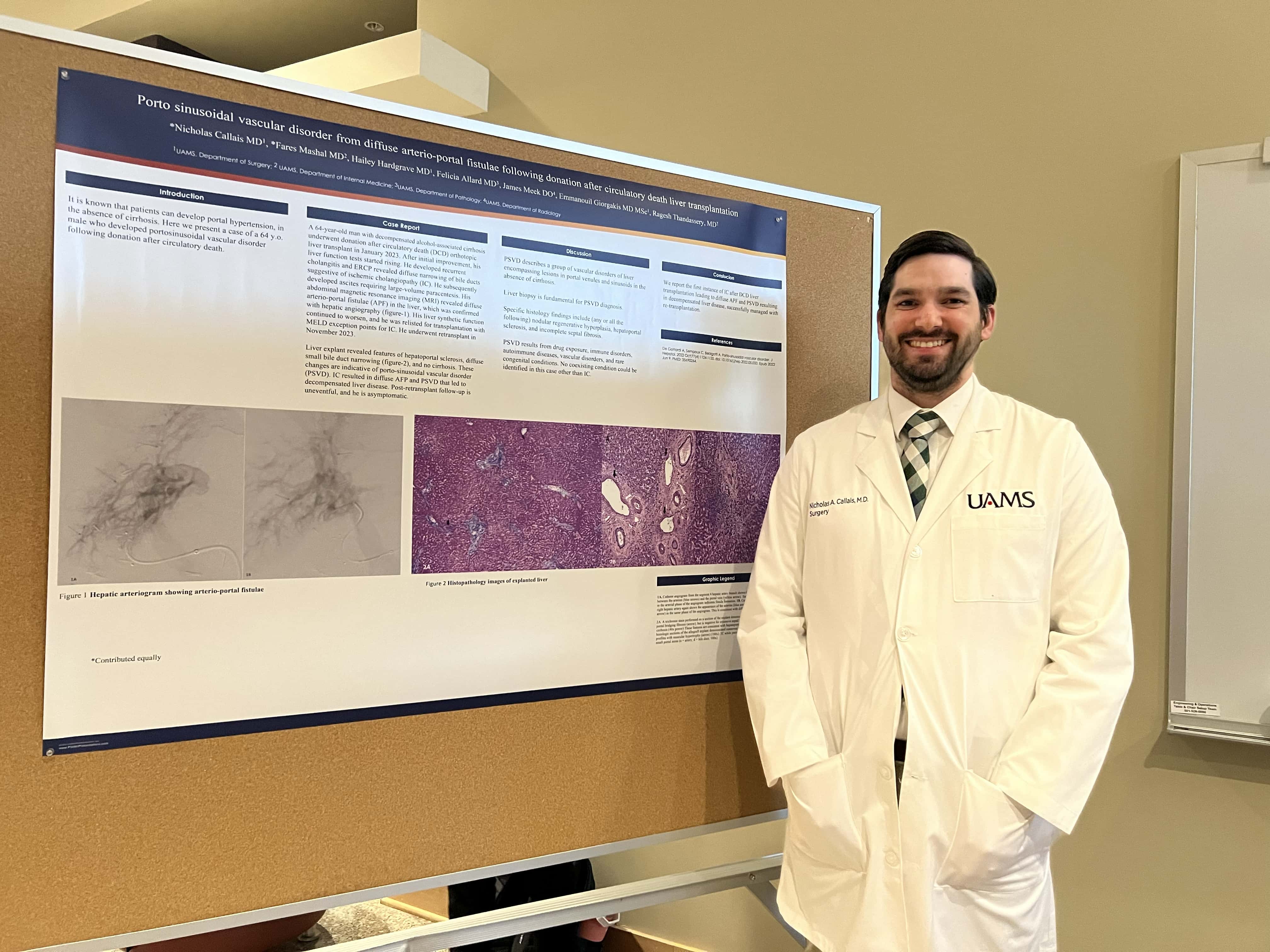 Student with research poster