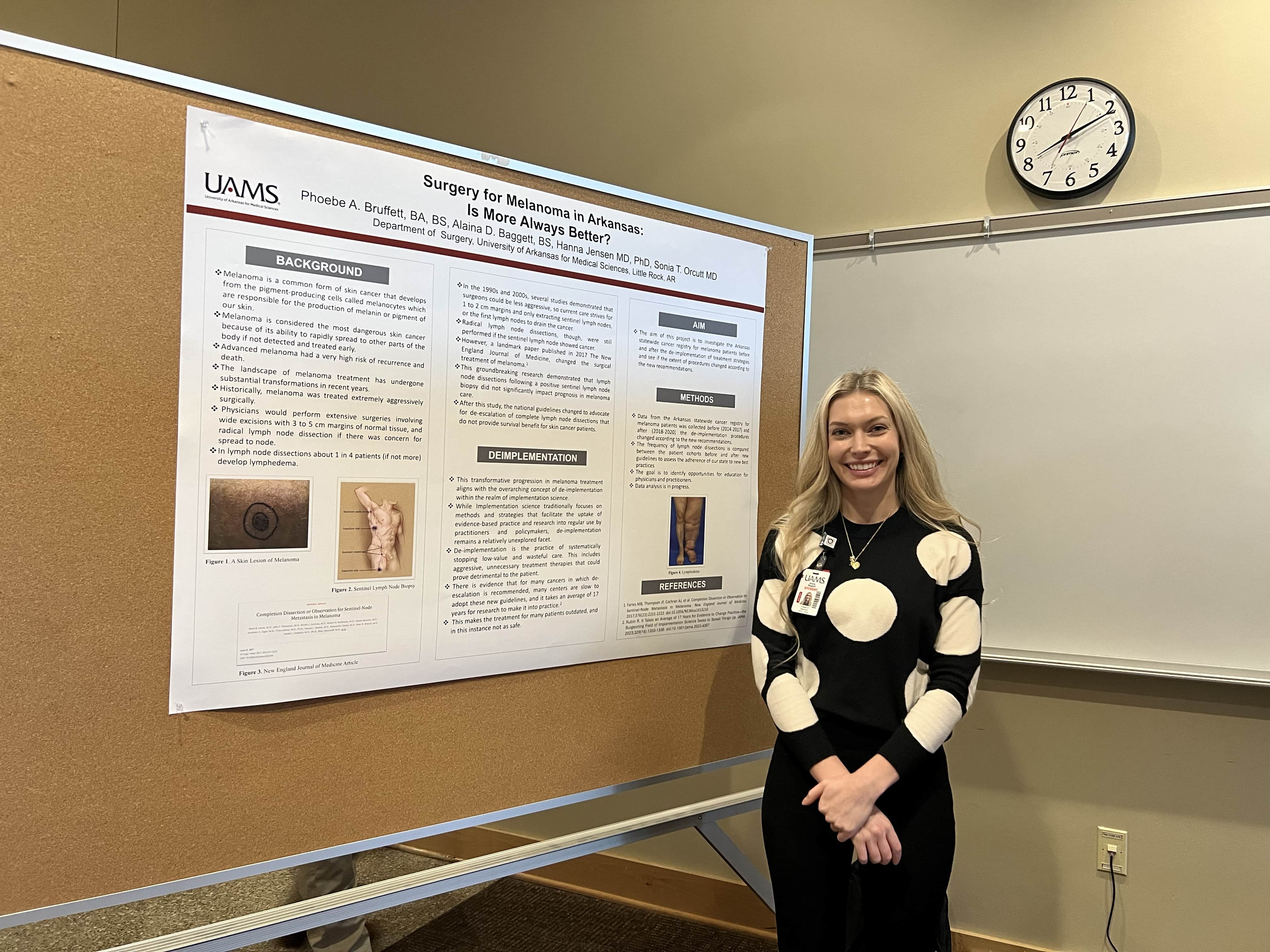 Student with research poster