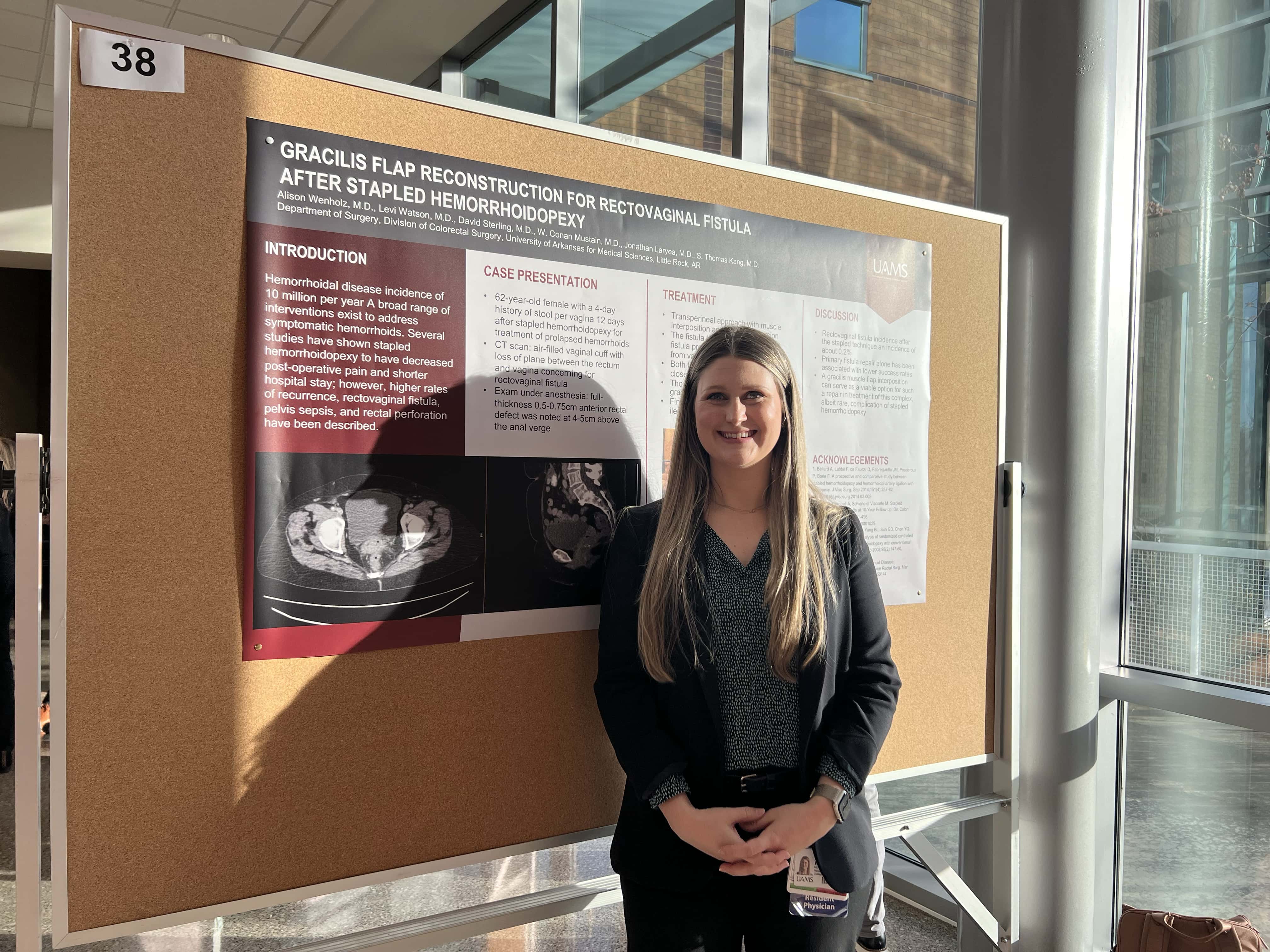 Student with research poster
