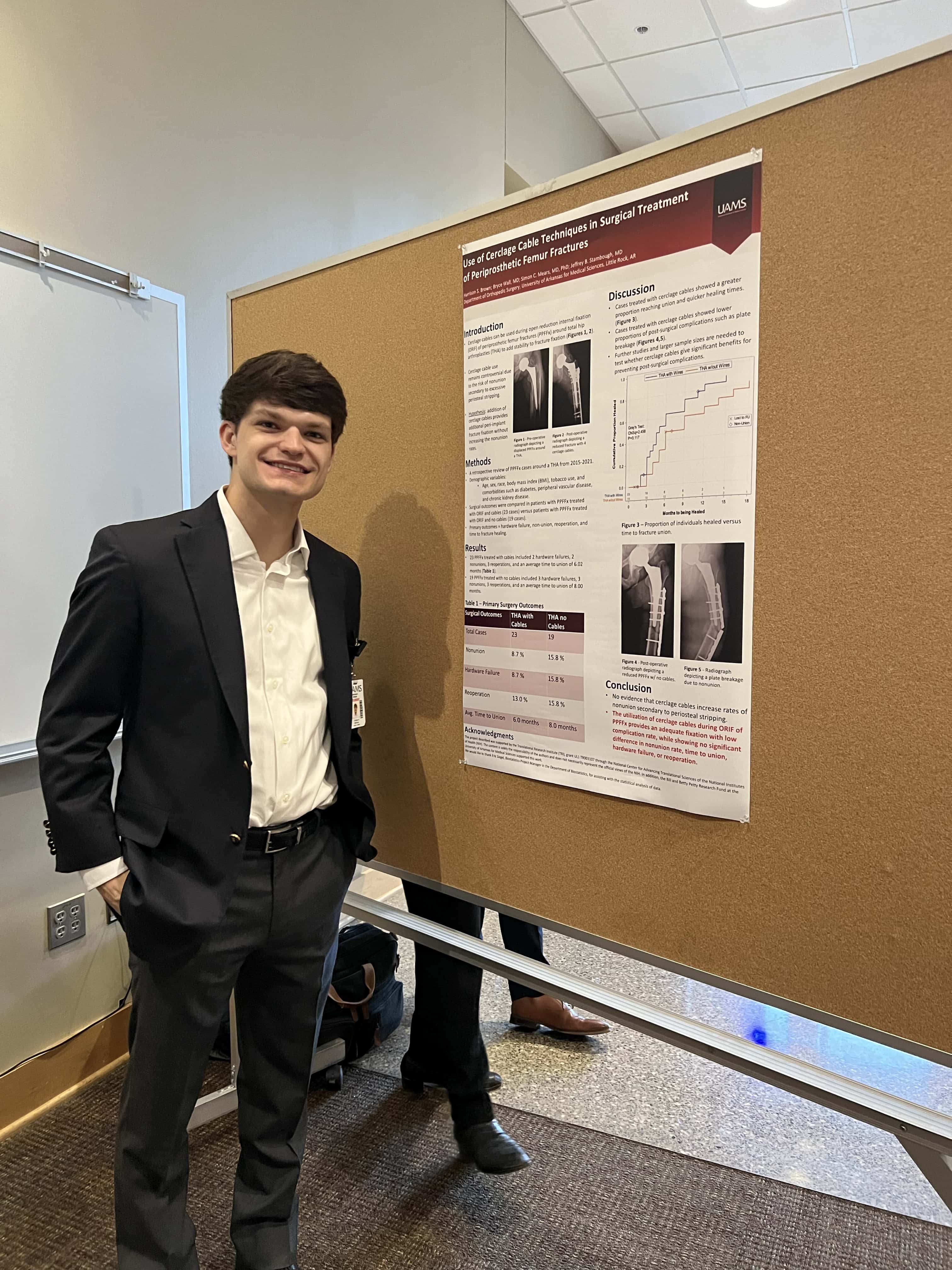 Student with research poster