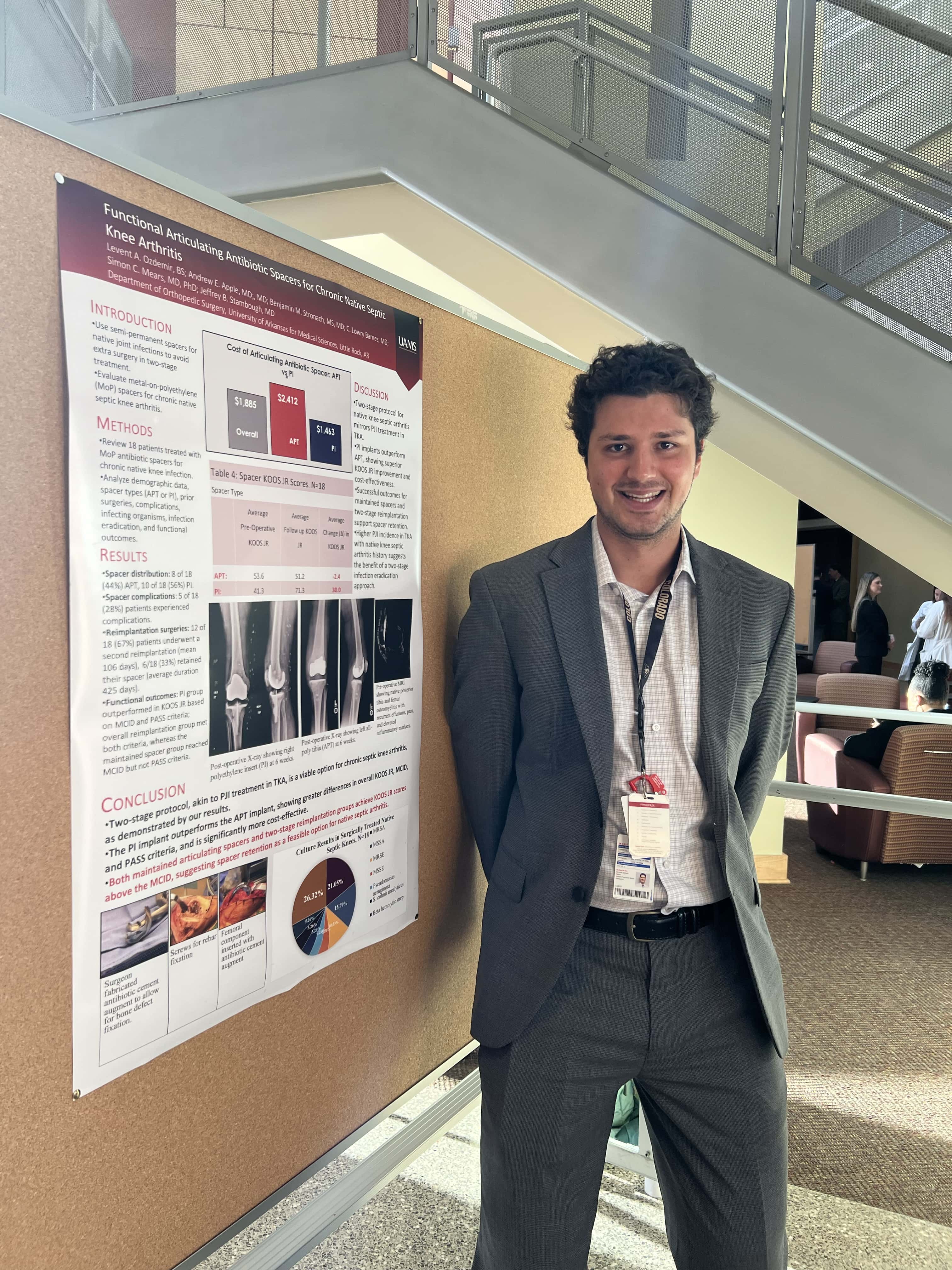 Student with research poster