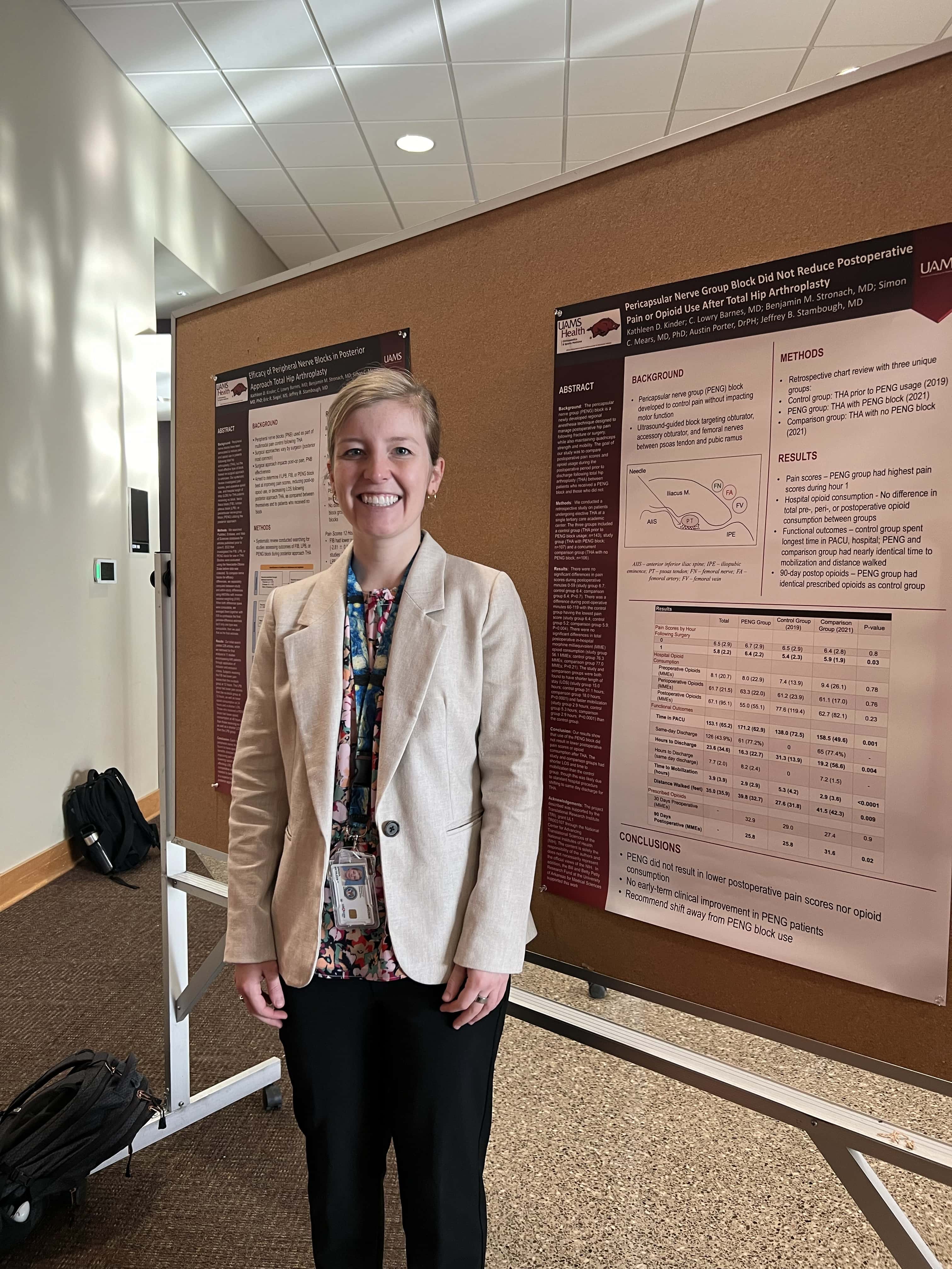 Student with research poster