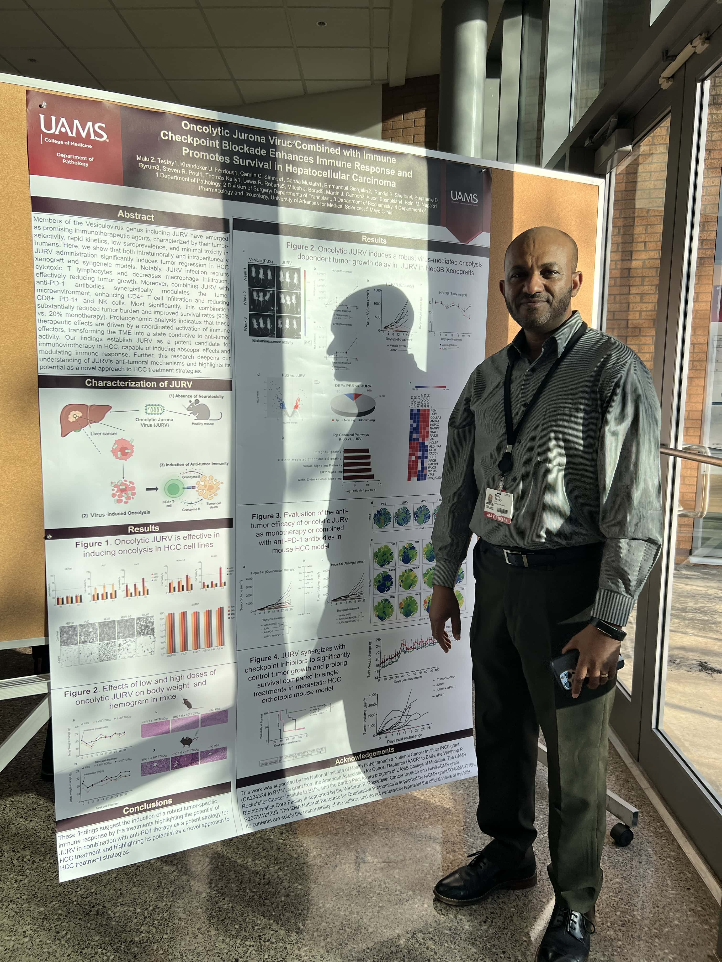 Student with research poster