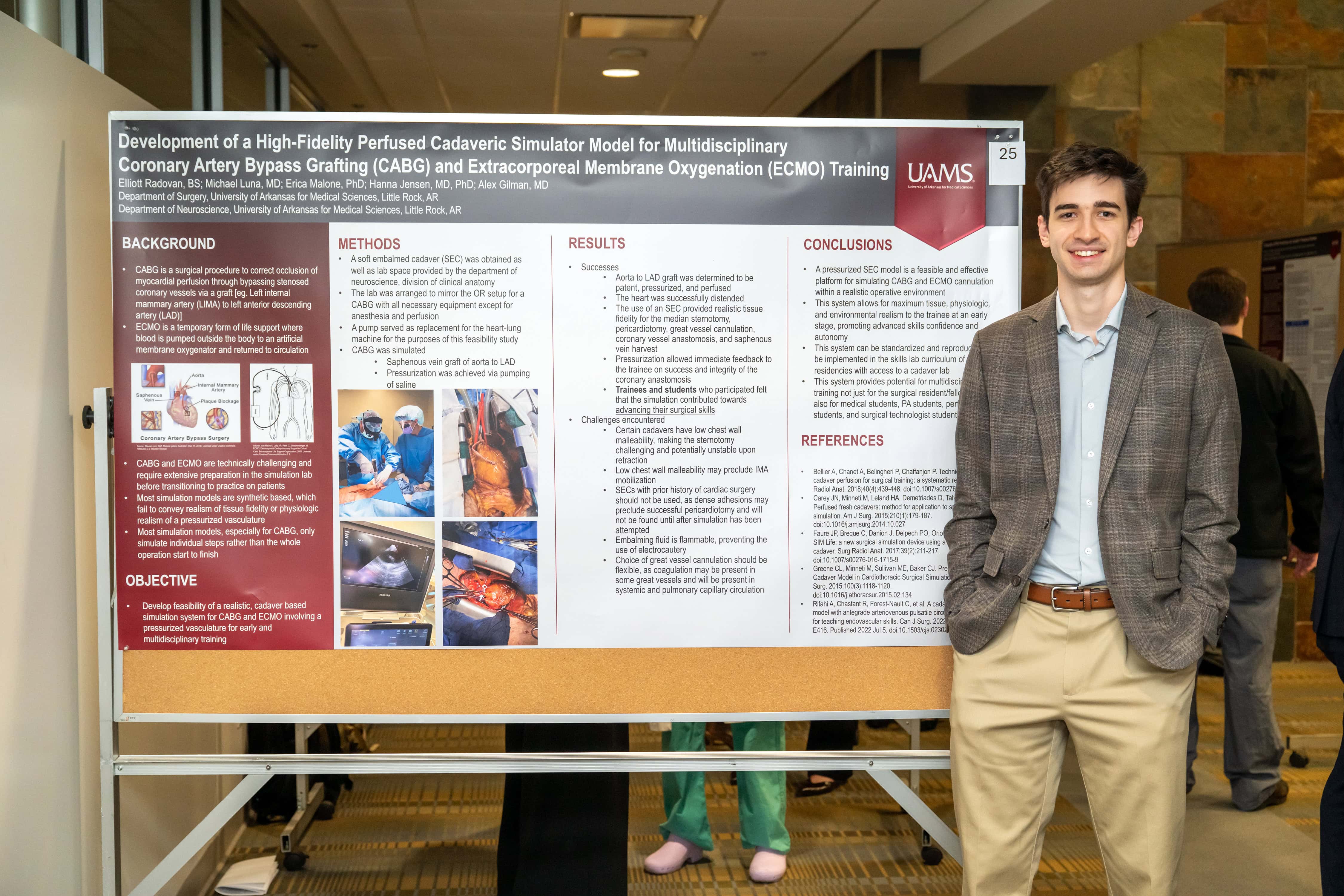 Elliot Radovan standing with his presentation