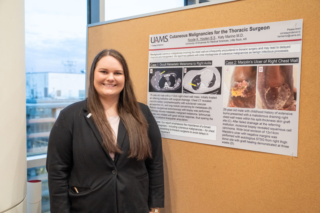 Nicole Hooten in front of her presentation