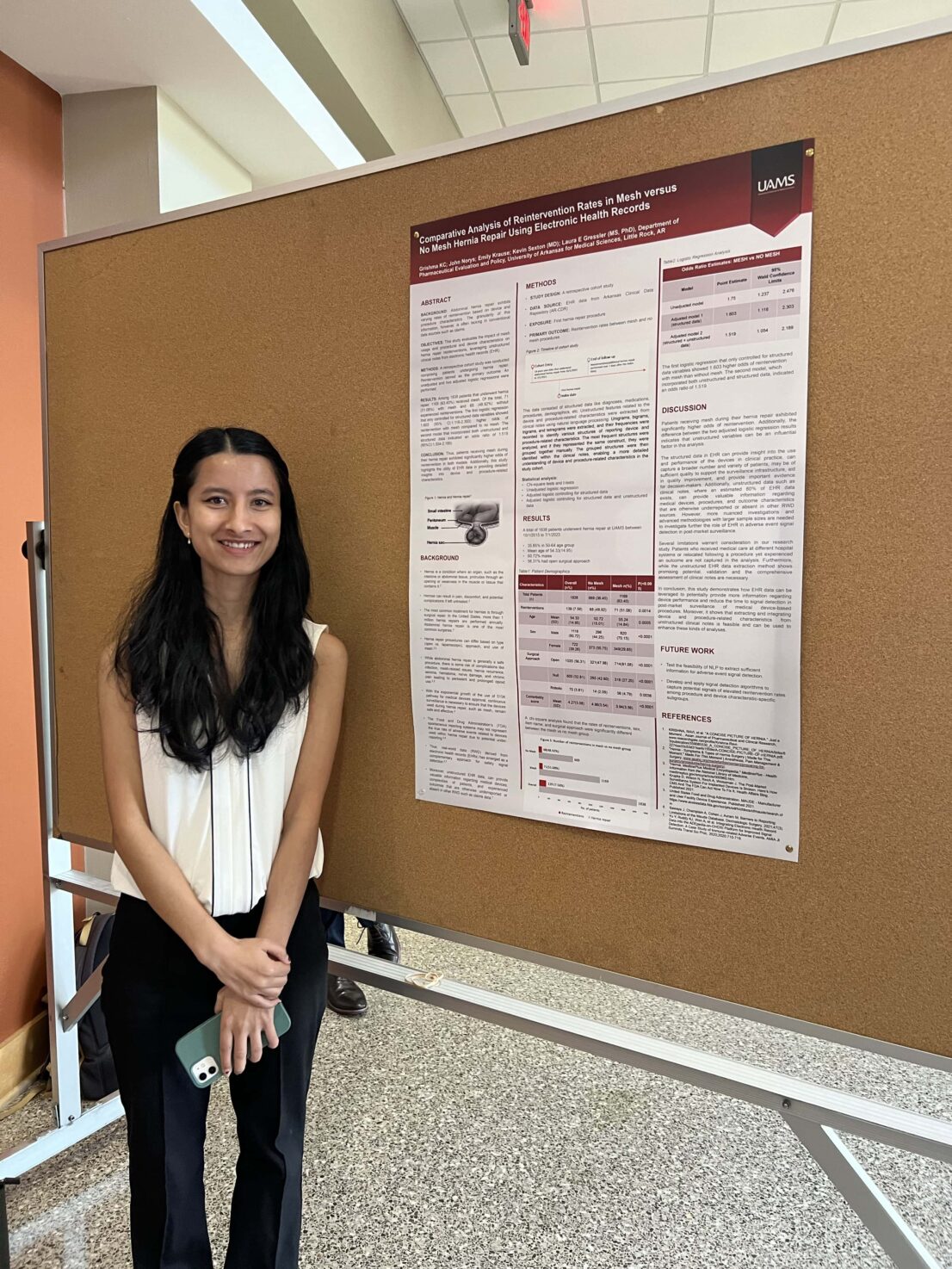 Student with research poster