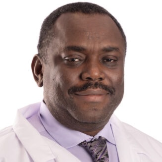 black male doctor in a white coat