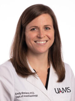 female physician in a white coat