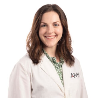 female doctor in a white coat