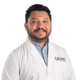 Jesus Beltran-Perez in a white coat