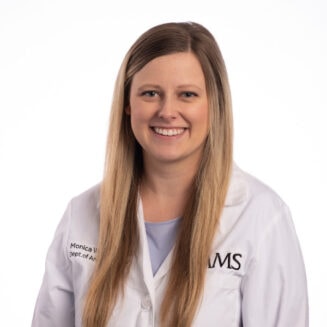 Monica Williams, M.D doctor in a white coat