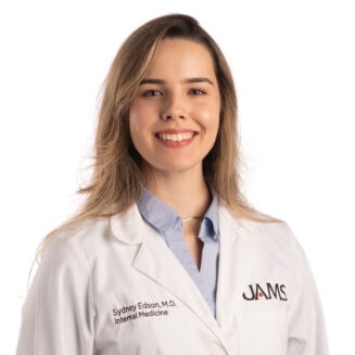 female doctor in a white coat