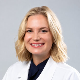 female physician in a white coat